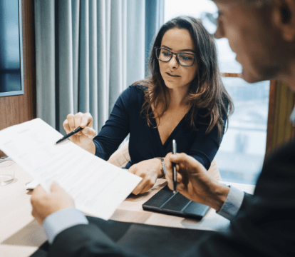 female lawyer speaking with a fellow lawyer