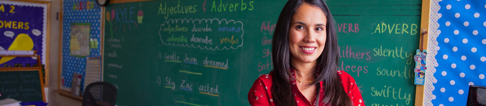 Abigail J. stands in front of a chalkboard. Learn about our scholarship for Sonoma County Office
of Education employees here.