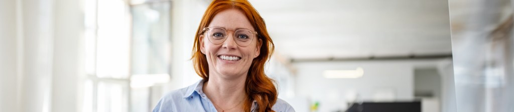 middle aged woman smiling into camera