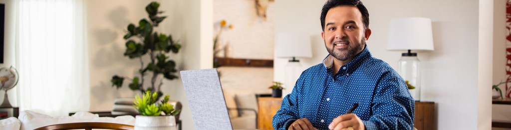 Person working on laptop at home